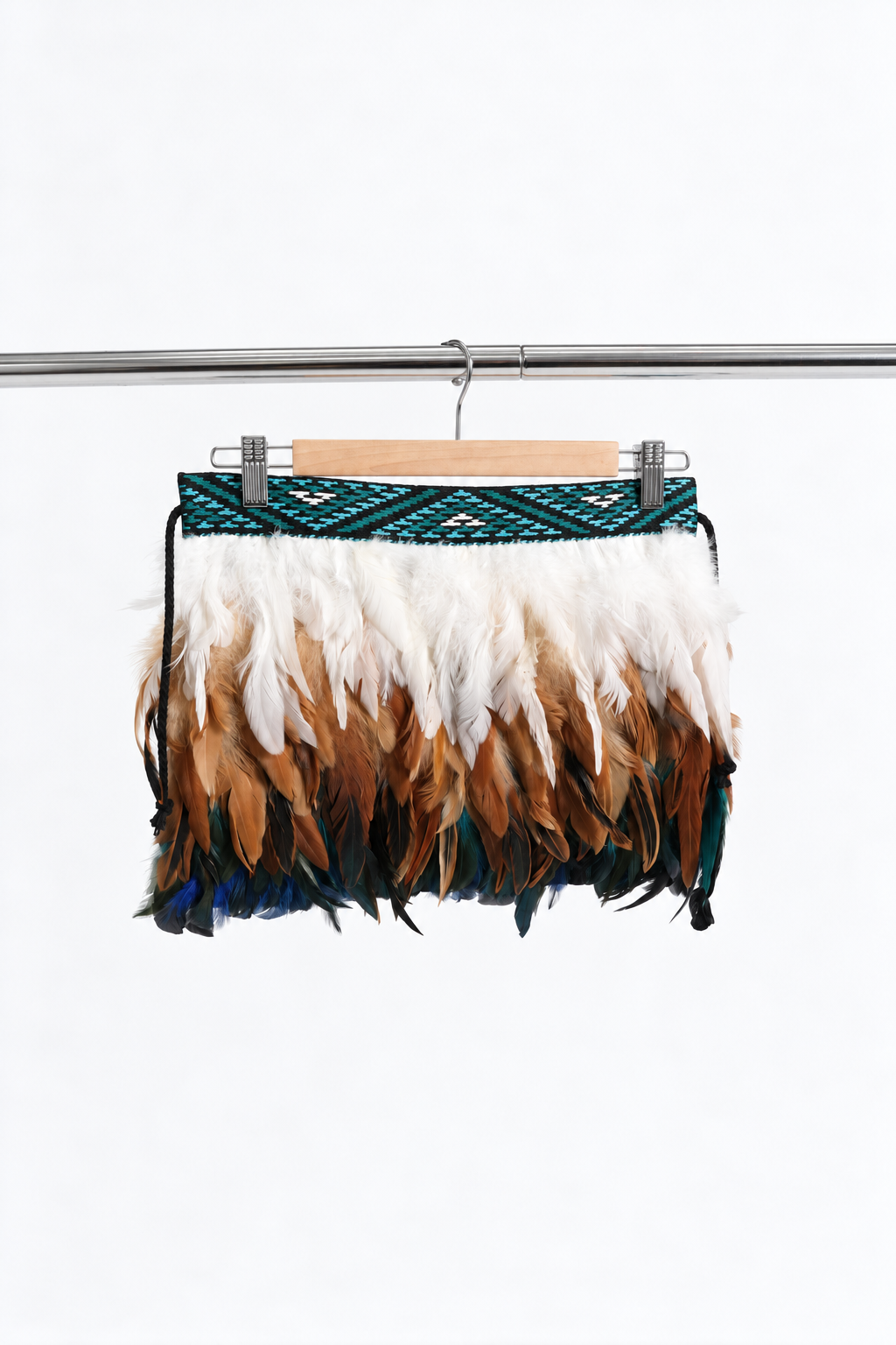 Kingfisher Blue children's korowai on a hanger