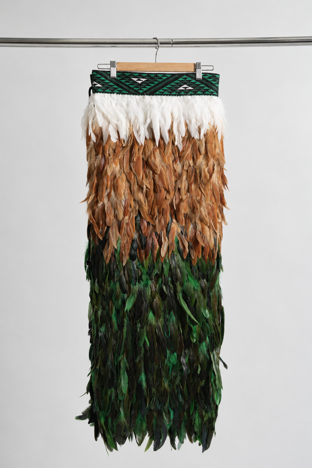Ngāhere Green contemporary adult korowai in Full length, hanging front view.