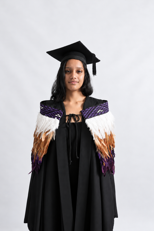 Wairua Purple korowai worn by a graduation model, front view